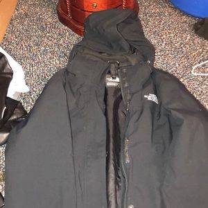Woman’s North Face rain jacket